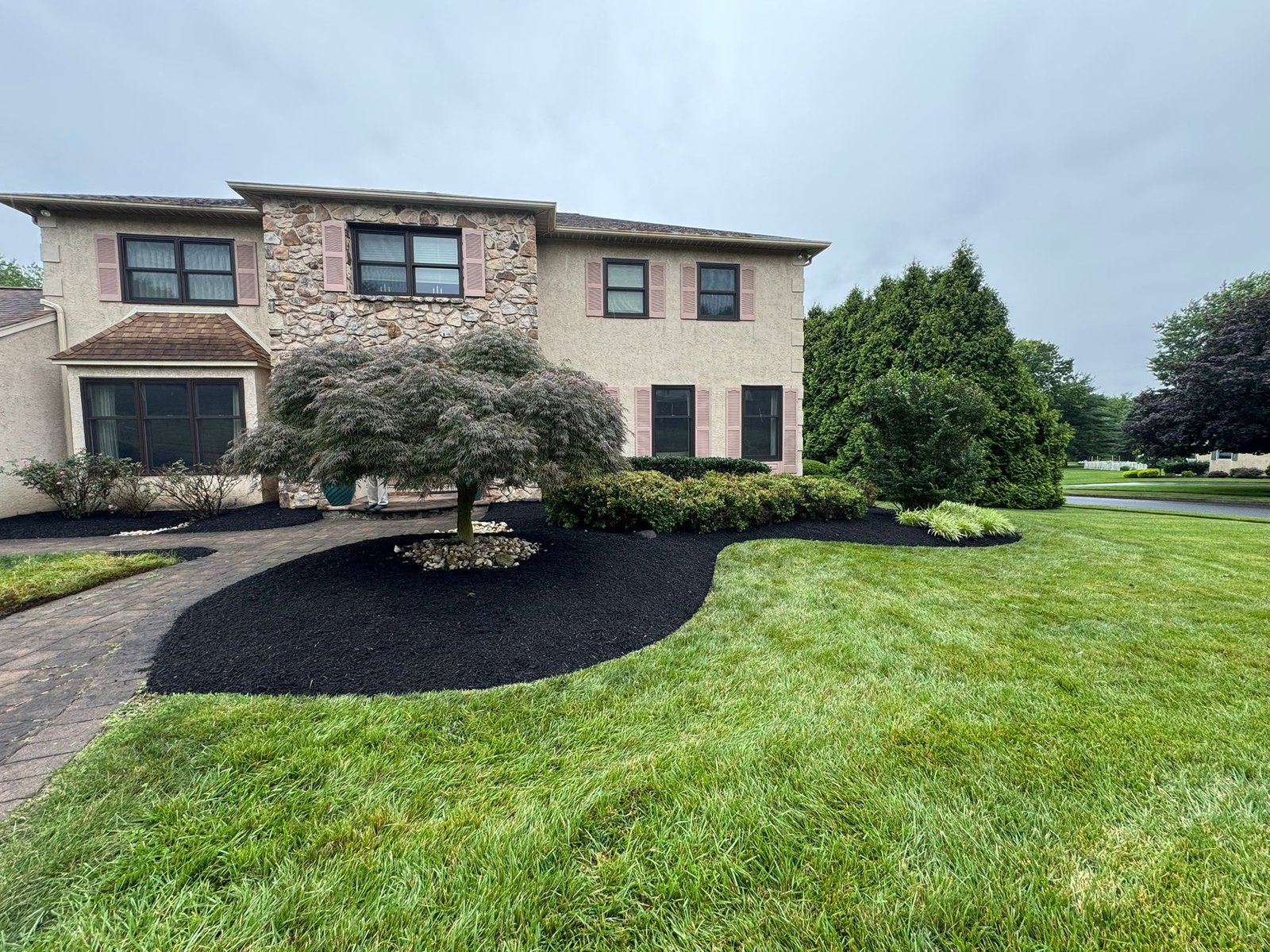 Mulch installation work by Green Force Property Services